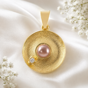 round brushed gold tone pendant